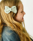 2PK BABY BLOOM CLIPS: gauze sage/black dot