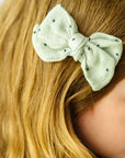 2PK BABY BLOOM CLIPS: gauze sage/black dot