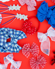 2PK NOVELTY SHOOTING STAR CLIPS: silver / red, white & blue