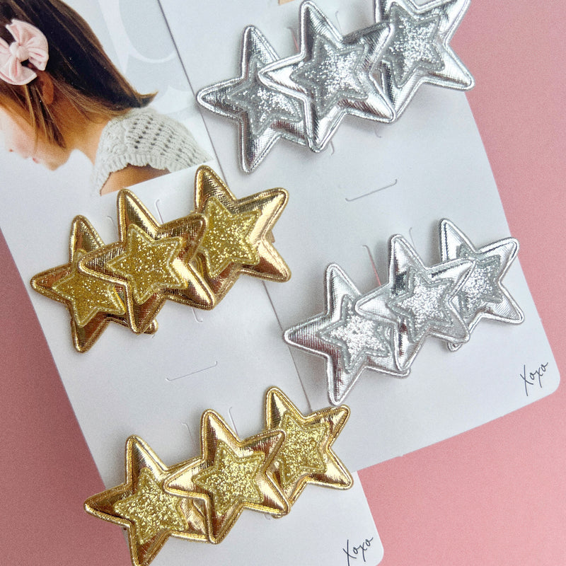2PK NOVELTY CLIPS: faux metal stars gold