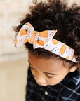 PRINTED TIED HARD HEADBAND: pumpkin