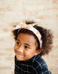 PRINTED TIED HARD HEADBAND: pumpkin