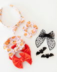 PRINTED TIED HARD HEADBAND: pumpkin